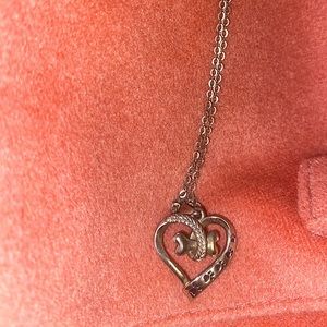 925 Sterling Silver chain and heart with bone pendant